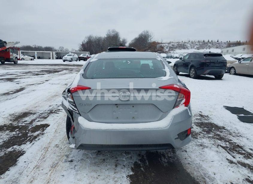 Photo 16 of 2018 Honda Civic LX (VIN 19XFC2E52JE026061)