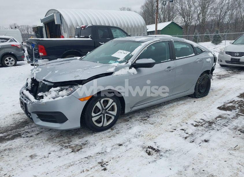 Photo 2 of 2018 Honda Civic LX (VIN 19XFC2E52JE026061)