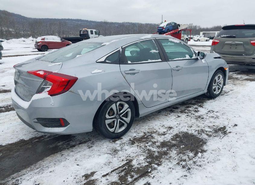 Photo 4 of 2018 Honda Civic LX (VIN 19XFC2E52JE026061)