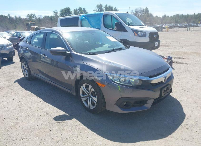 2018 Honda Civic LX (VIN 19XFC2E53JE031494) main photo