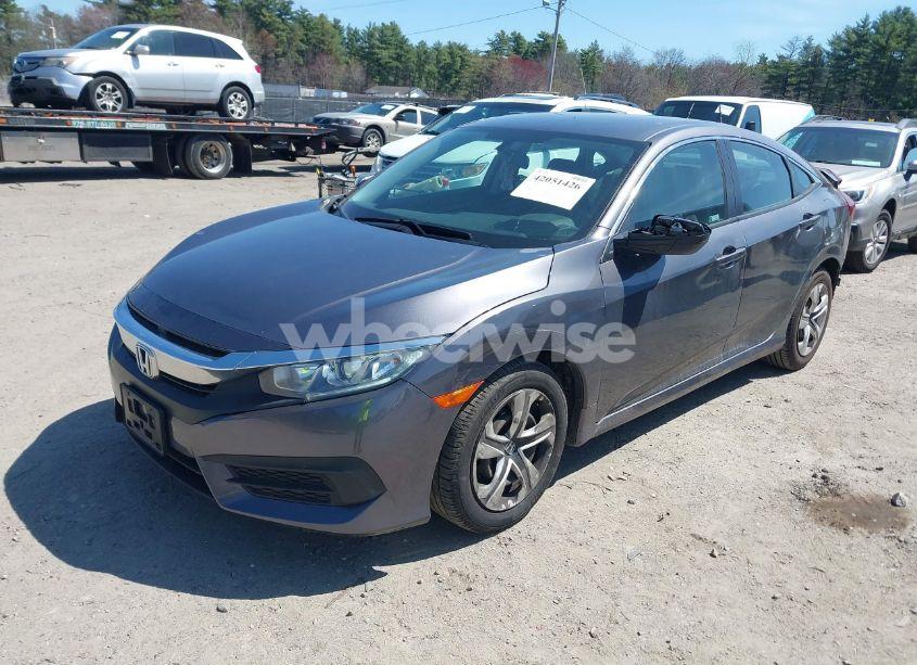 Photo 2 of 2018 Honda Civic LX (VIN 19XFC2E53JE031494)