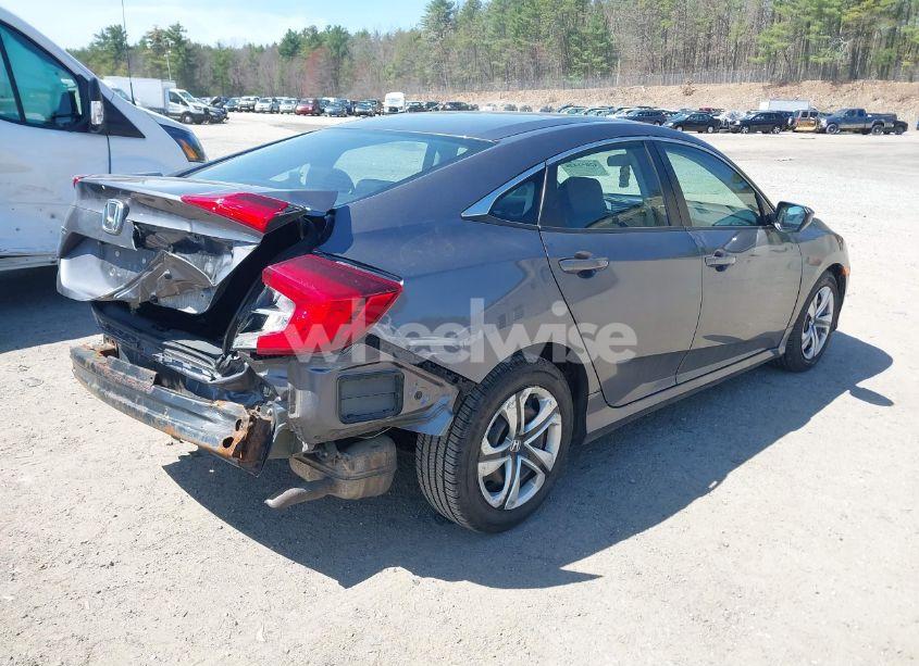 Photo 4 of 2018 Honda Civic LX (VIN 19XFC2E53JE031494)