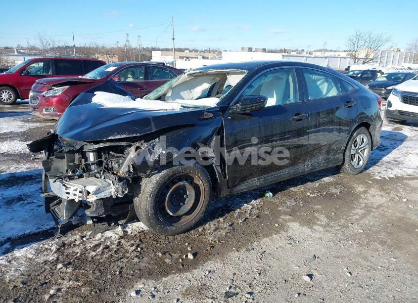 Photo 2 of 2018 Honda Civic LX (VIN 19XFC2E54JE001582)