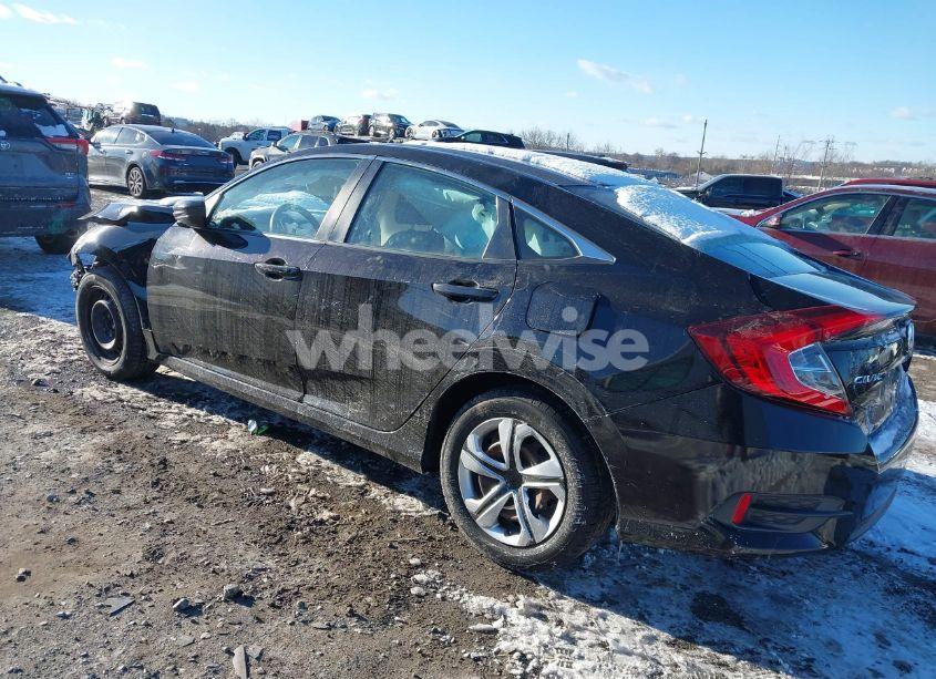 Photo 3 of 2018 Honda Civic LX (VIN 19XFC2E54JE001582)