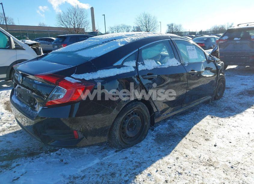 Photo 4 of 2018 Honda Civic LX (VIN 19XFC2E54JE001582)