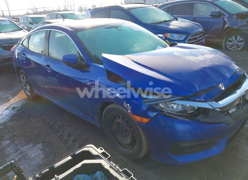 2018 Honda Civic LX (VIN 19XFC2E55JE038821) main photo