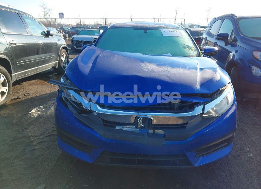 Photo 12 of 2018 Honda Civic LX (VIN 19XFC2E55JE038821)