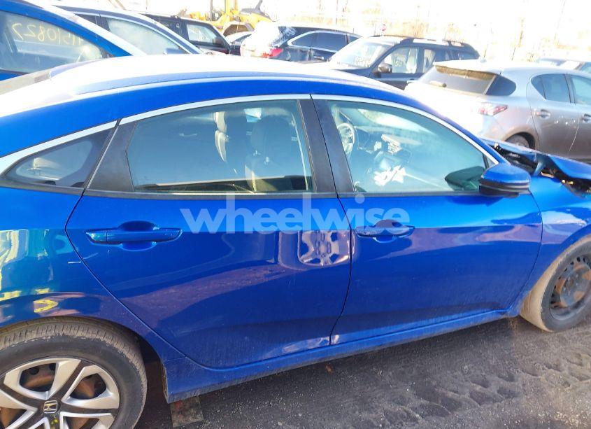 Photo 13 of 2018 Honda Civic LX (VIN 19XFC2E55JE038821)