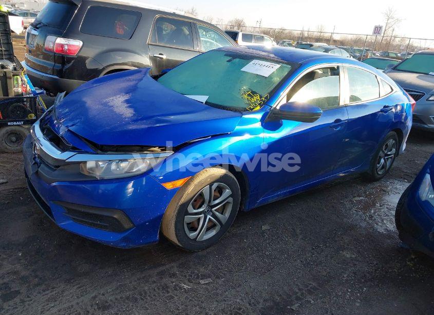 Photo 2 of 2018 Honda Civic LX (VIN 19XFC2E55JE038821)