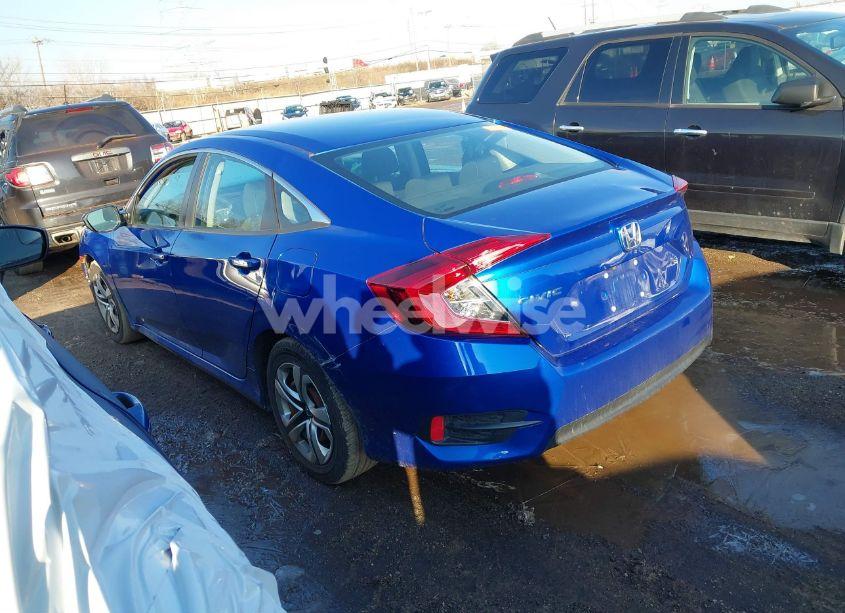 Photo 3 of 2018 Honda Civic LX (VIN 19XFC2E55JE038821)