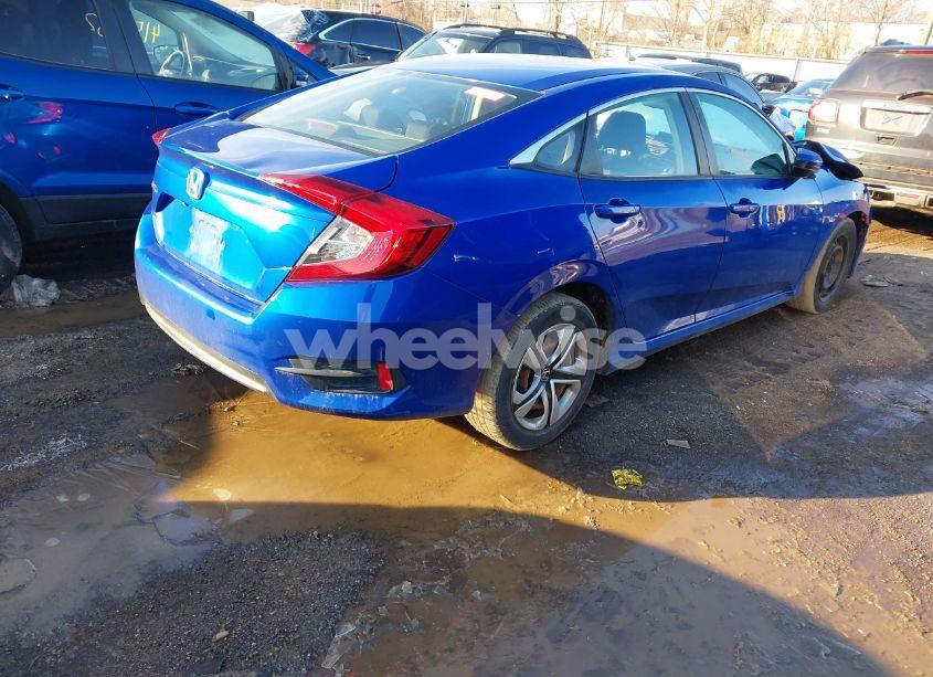 Photo 4 of 2018 Honda Civic LX (VIN 19XFC2E55JE038821)