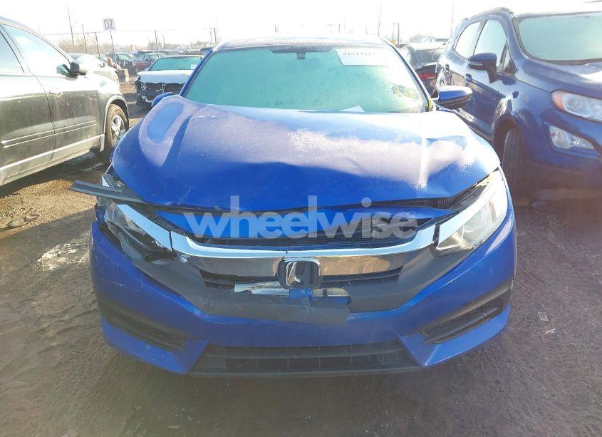 Photo 6 of 2018 Honda Civic LX (VIN 19XFC2E55JE038821)