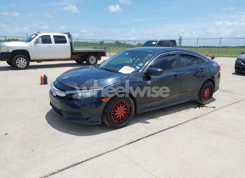 Photo 2 of 2017 Honda Civic LX (VIN 19XFC2E56HE059302)