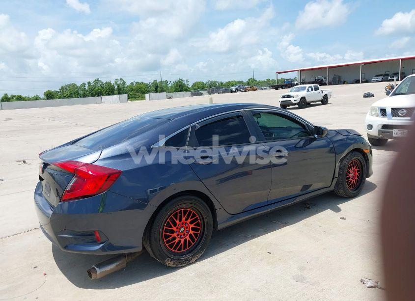 Photo 4 of 2017 Honda Civic LX (VIN 19XFC2E56HE059302)