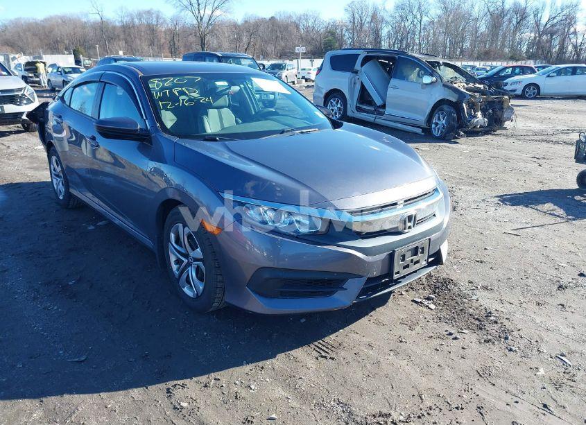 2018 Honda Civic LX (VIN 19XFC2E56JE015323) main photo