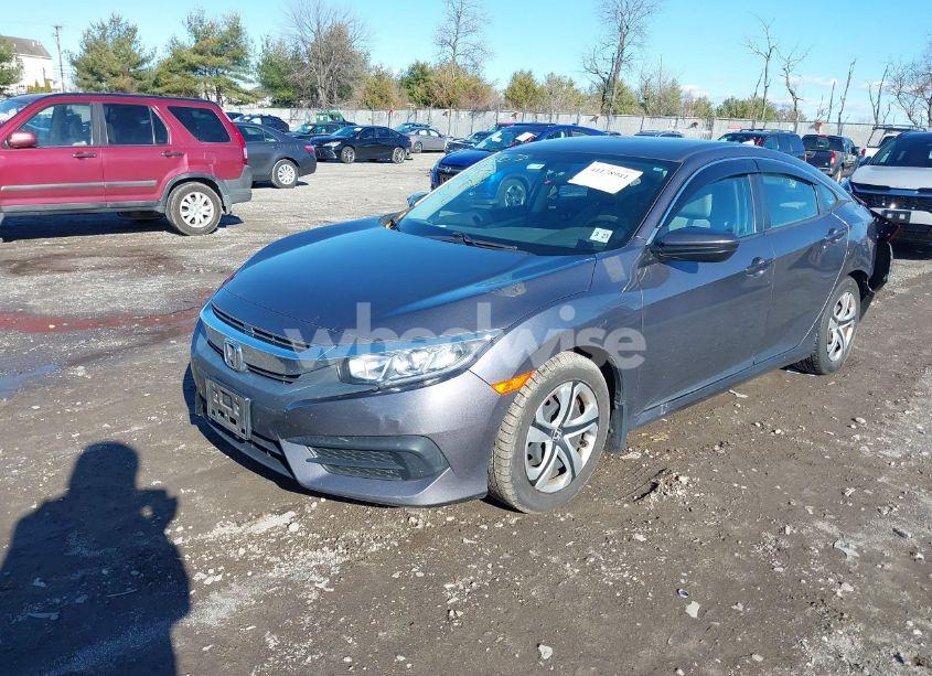 Photo 2 of 2018 Honda Civic LX (VIN 19XFC2E56JE015323)