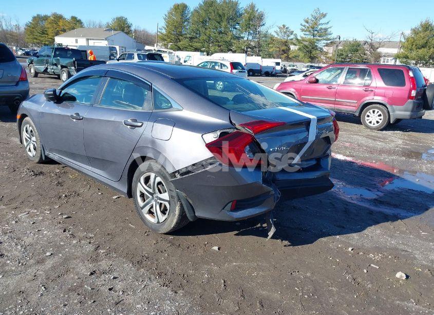 Photo 3 of 2018 Honda Civic LX (VIN 19XFC2E56JE015323)