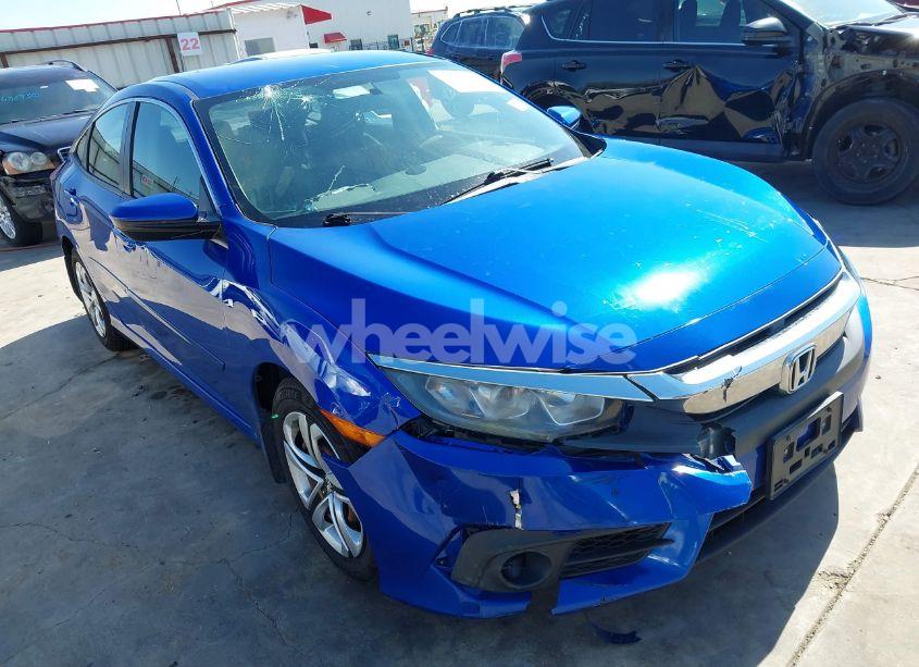 2018 Honda Civic LX (VIN 19XFC2E56JE032848) main photo