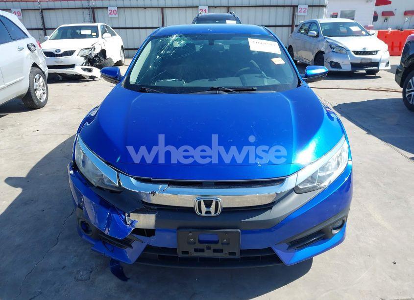 Photo 12 of 2018 Honda Civic LX (VIN 19XFC2E56JE032848)