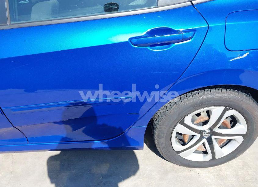 Photo 19 of 2018 Honda Civic LX (VIN 19XFC2E56JE032848)