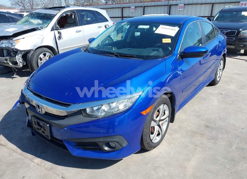 Photo 2 of 2018 Honda Civic LX (VIN 19XFC2E56JE032848)