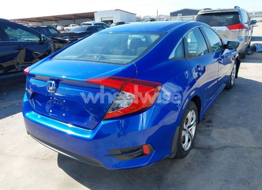 Photo 4 of 2018 Honda Civic LX (VIN 19XFC2E56JE032848)