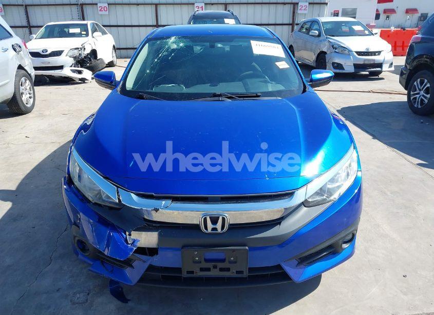Photo 6 of 2018 Honda Civic LX (VIN 19XFC2E56JE032848)