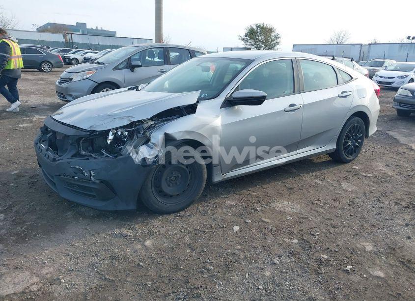 Photo 2 of 2018 Honda Civic LX (VIN 19XFC2E58JE037887)