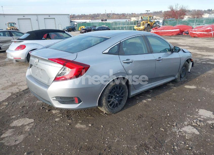 Photo 4 of 2018 Honda Civic LX (VIN 19XFC2E58JE037887)