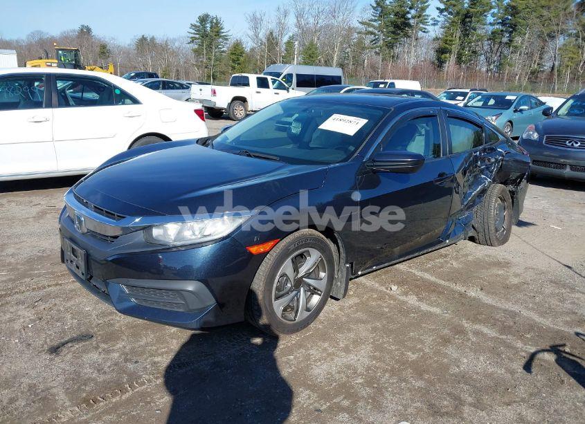 Photo 2 of 2017 Honda Civic LX (VIN 19XFC2E5XHE021328)