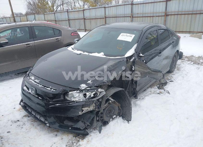 Photo 2 of 2018 Honda Civic LX (VIN 19XFC2E5XJE000565)