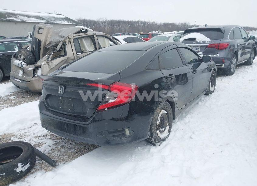 Photo 4 of 2018 Honda Civic LX (VIN 19XFC2E5XJE000565)