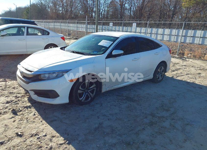 Photo 2 of 2017 Honda Civic LX (VIN 19XFC2F50HE007646)