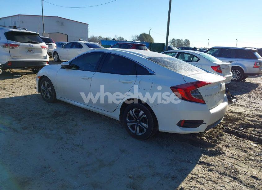 Photo 3 of 2017 Honda Civic LX (VIN 19XFC2F50HE007646)