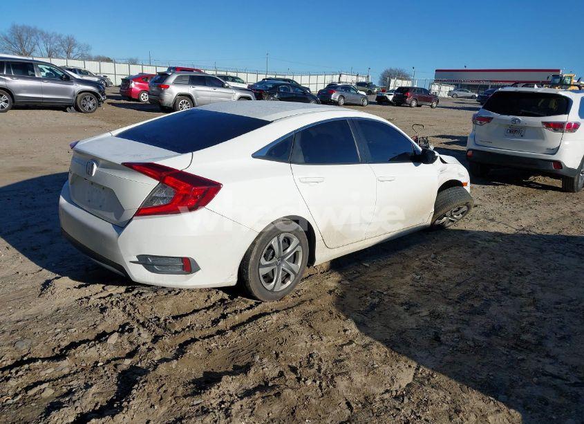 Photo 4 of 2017 Honda Civic LX (VIN 19XFC2F50HE007646)