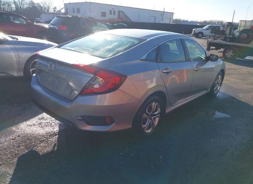 Photo 4 of 2017 Honda Civic LX (VIN 19XFC2F50HE018131)
