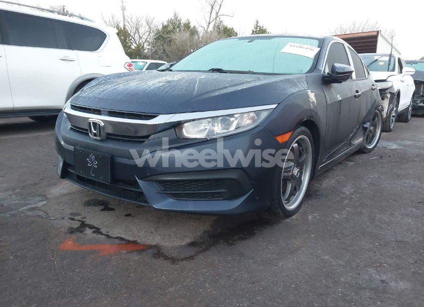 Photo 2 of 2017 Honda Civic LX (VIN 19XFC2F50HE027444)