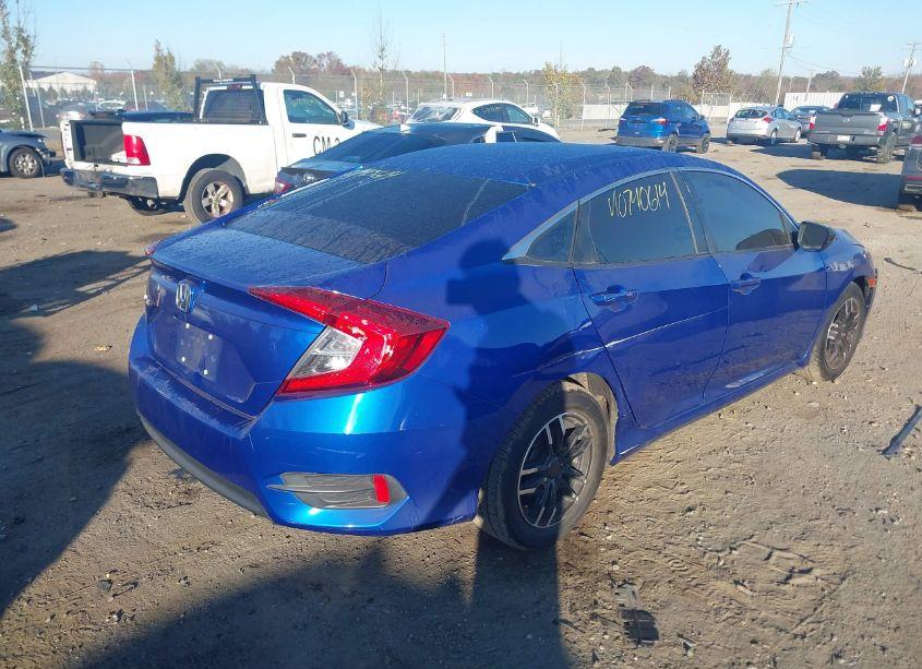 Photo 4 of 2017 Honda Civic LX (VIN 19XFC2F50HE031655)