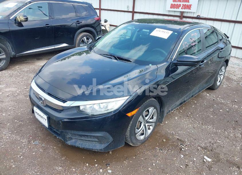 Photo 2 of 2017 Honda Civic LX (VIN 19XFC2F50HE058340)