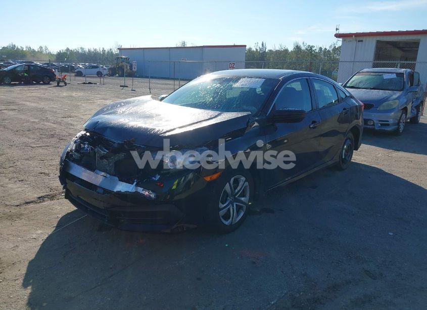 Photo 2 of 2017 Honda Civic LX (VIN 19XFC2F50HE065918)