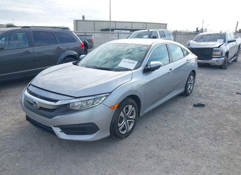 Photo 2 of 2017 Honda Civic LX (VIN 19XFC2F50HE072917)