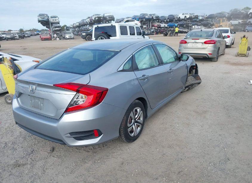 Photo 4 of 2017 Honda Civic LX (VIN 19XFC2F50HE072917)