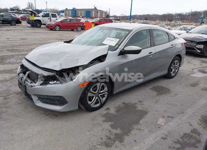 Photo 2 of 2017 Honda Civic LX (VIN 19XFC2F50HE073033)