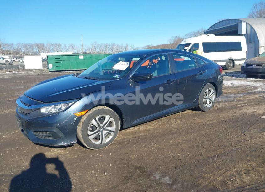 Photo 2 of 2017 Honda Civic LX (VIN 19XFC2F50HE211251)