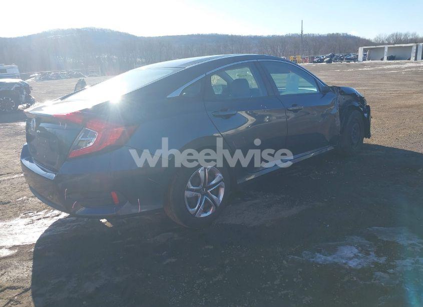 Photo 4 of 2017 Honda Civic LX (VIN 19XFC2F50HE211251)