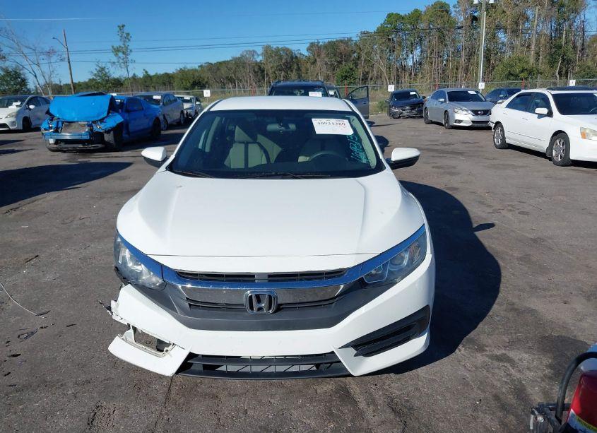 Photo 12 of 2018 Honda Civic LX (VIN 19XFC2F50JE008303)