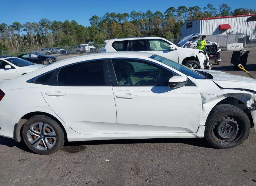 Photo 13 of 2018 Honda Civic LX (VIN 19XFC2F50JE008303)