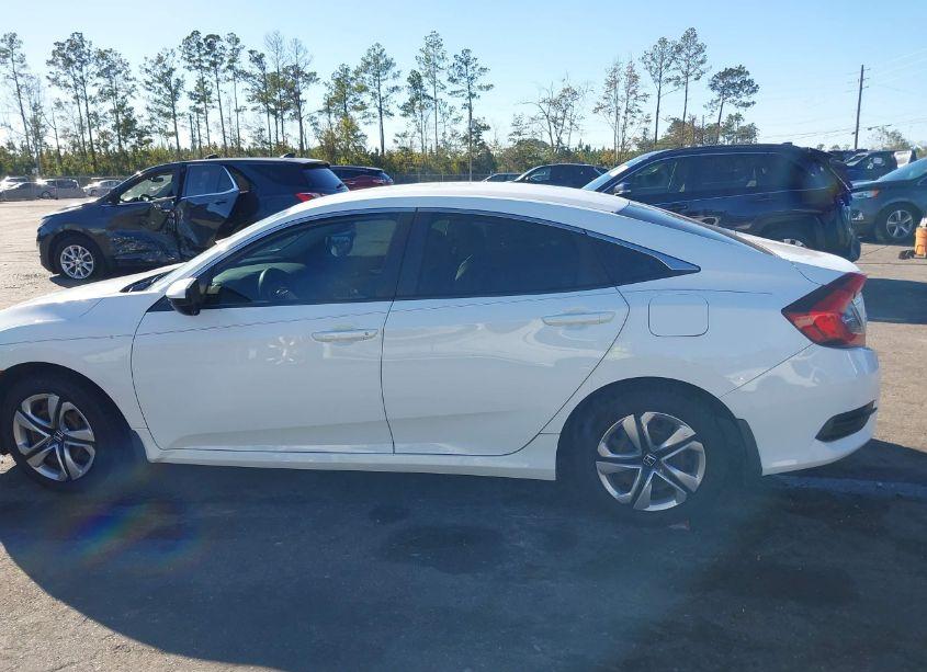 Photo 14 of 2018 Honda Civic LX (VIN 19XFC2F50JE008303)