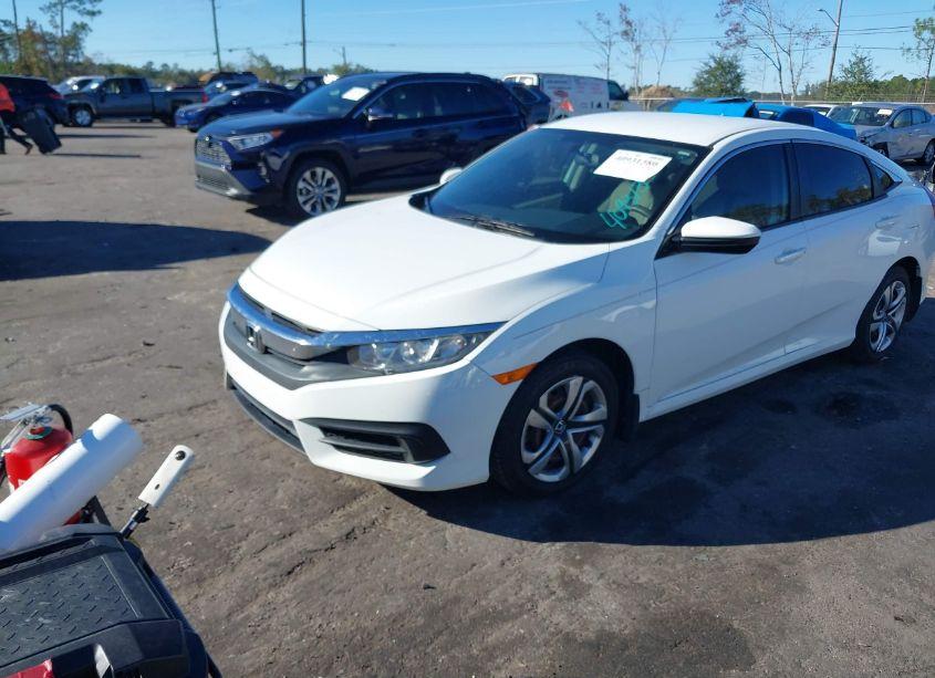 Photo 2 of 2018 Honda Civic LX (VIN 19XFC2F50JE008303)