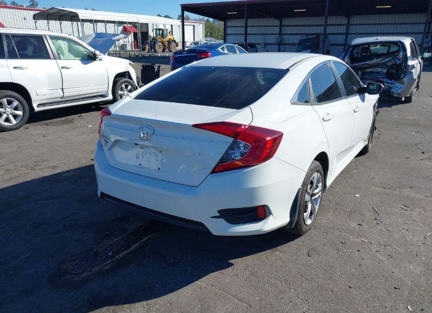 Photo 4 of 2018 Honda Civic LX (VIN 19XFC2F50JE008303)